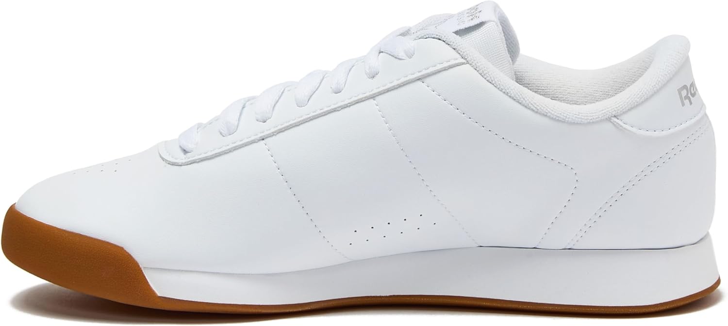 White Reebok Princess sneaker with cushioned sole, minimal design for athleisure wear — view 3