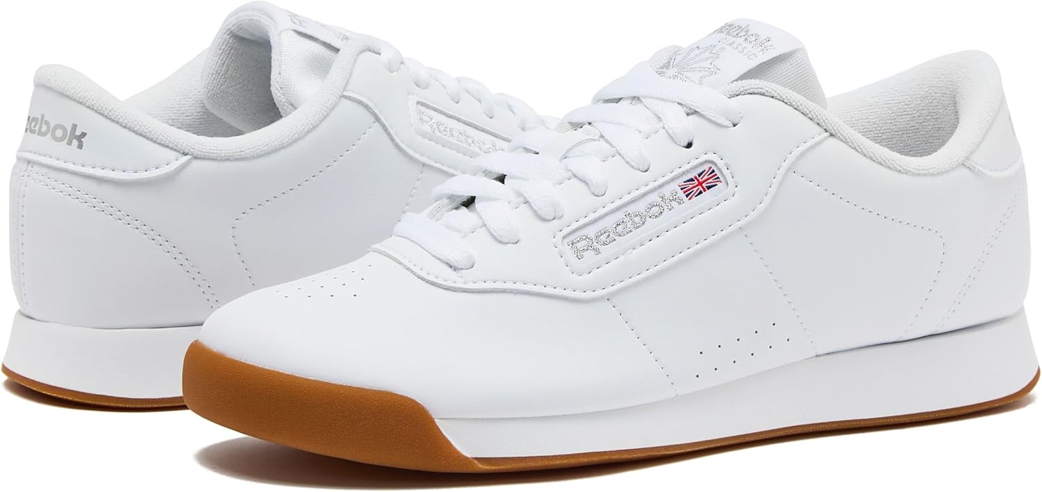 White Reebok Princess sneaker with cushioned sole, minimal design for athleisure wear — view 3