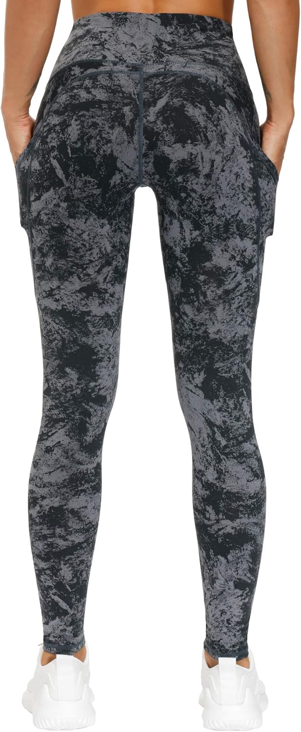 Black high-waisted yoga leggings with squat-proof compression fabric and side pockets — view 3