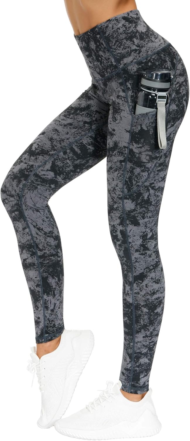 Black high-waisted yoga leggings with squat-proof compression fabric and side pockets — view 2