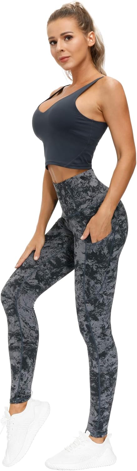 Black high-waisted yoga leggings with squat-proof compression fabric and side pockets — view 3