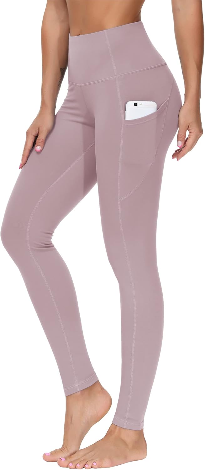 Black high-waisted yoga leggings with squat-proof compression fabric and side pockets — view 5