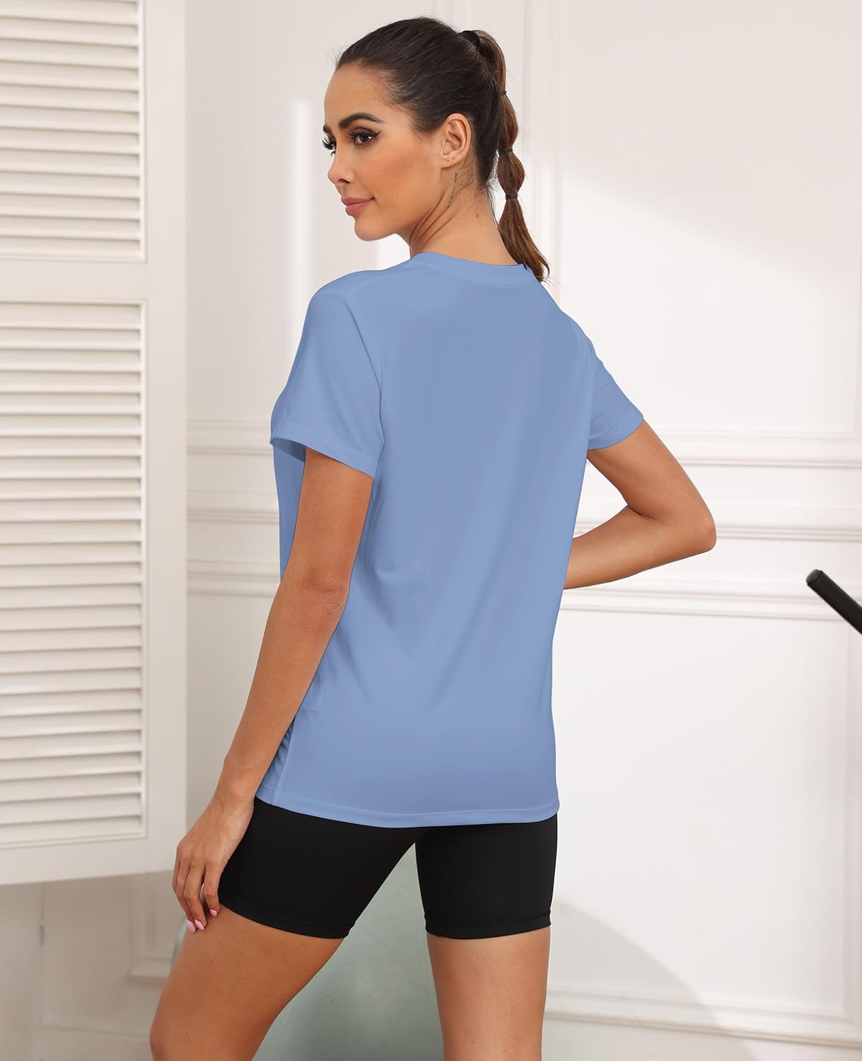 Women's UPF50+ breathable running tee in {color} with relaxed fit, shown front and back — view 2
