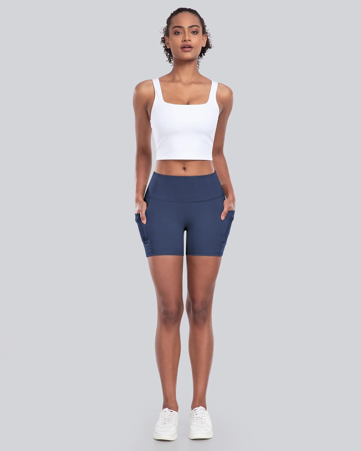 High-waisted biker yoga shorts in {color} with side pockets and squat-proof compression fabric — view 2