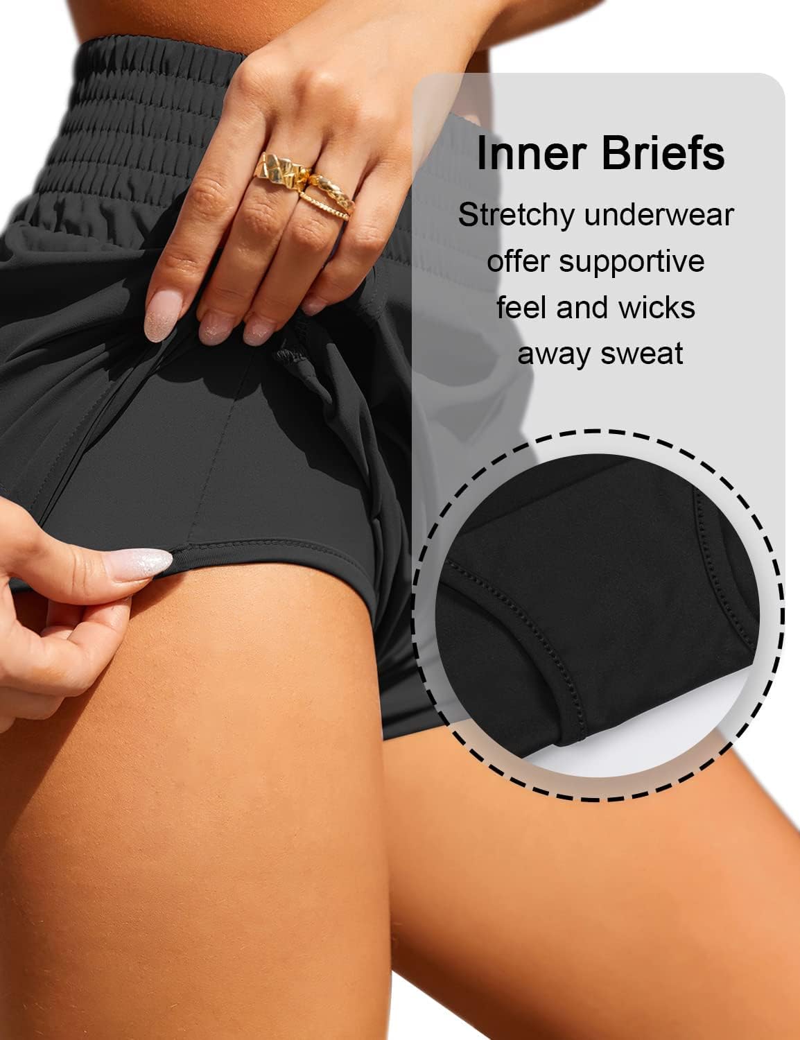 High-waisted black running shorts with side pockets and four-way stretch fabric — view 2