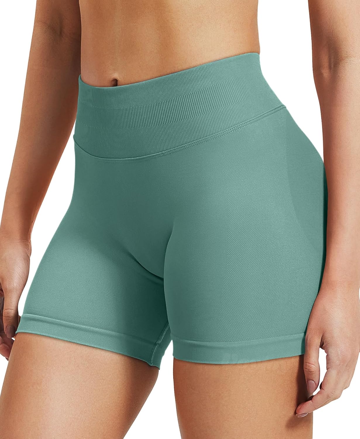 Black seamless scrunch butt lifting shorts with four-way stretch, shown from front and back angles โ view 3