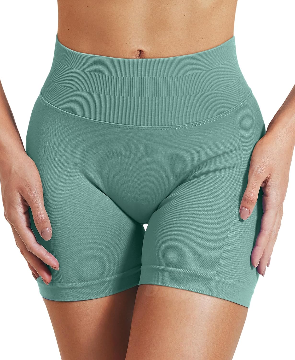 Black seamless scrunch butt lifting shorts with four-way stretch, shown from front and back angles โ view 4