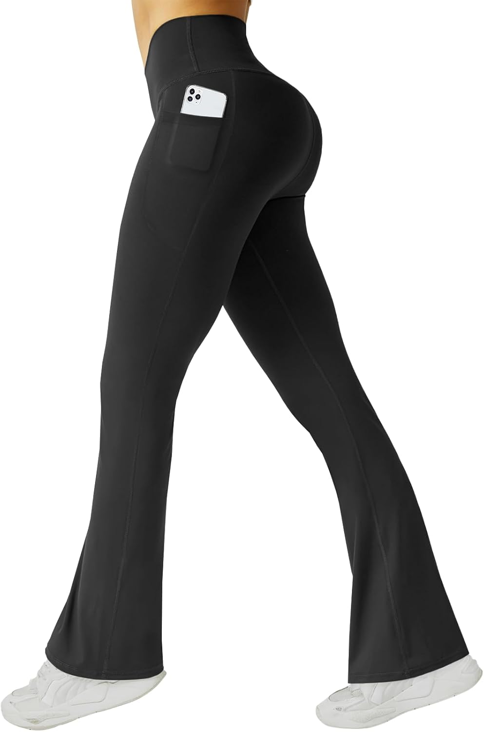Black high-waisted flare yoga pants with pockets and tummy control — view 1