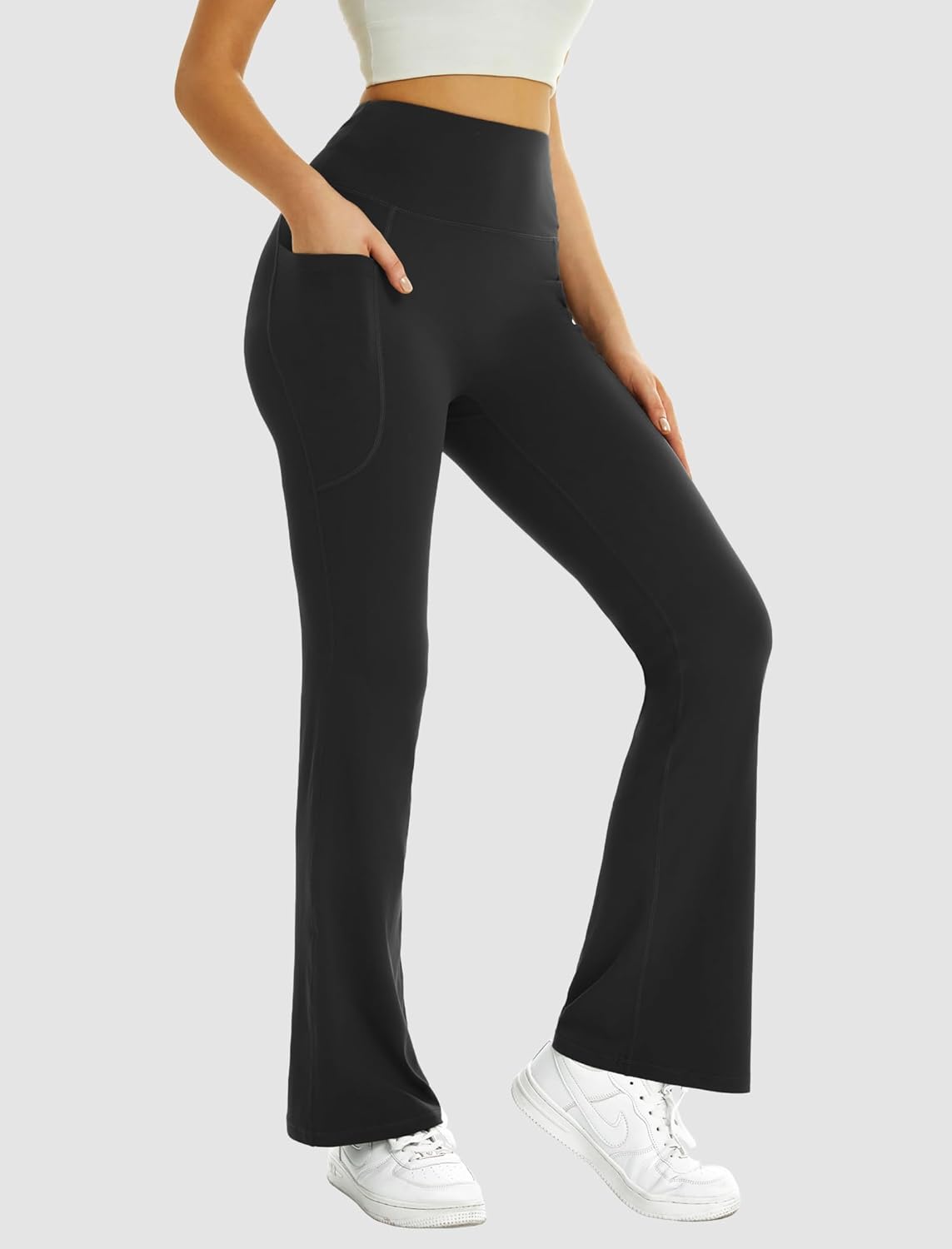Black high-waisted flare yoga pants with pockets and tummy control — view 2