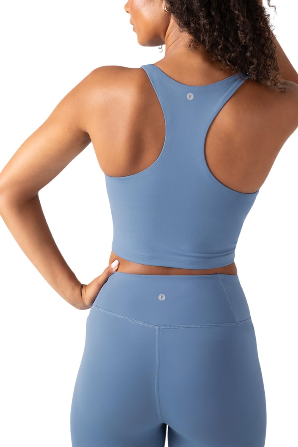 Black racerback sports bra tank with removable cups and low-impact support, front view โ view 2