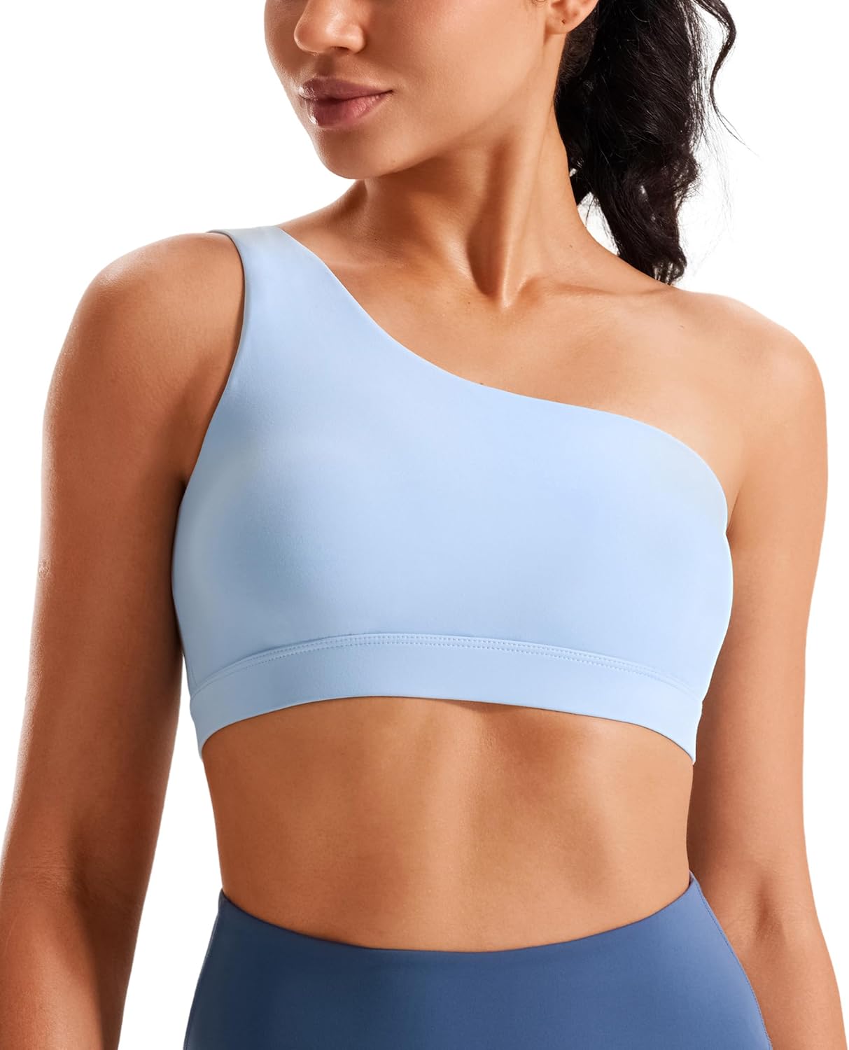 Black one-shoulder padded yoga bra with asymmetrical strap and four-way stretch fabric โ view 5