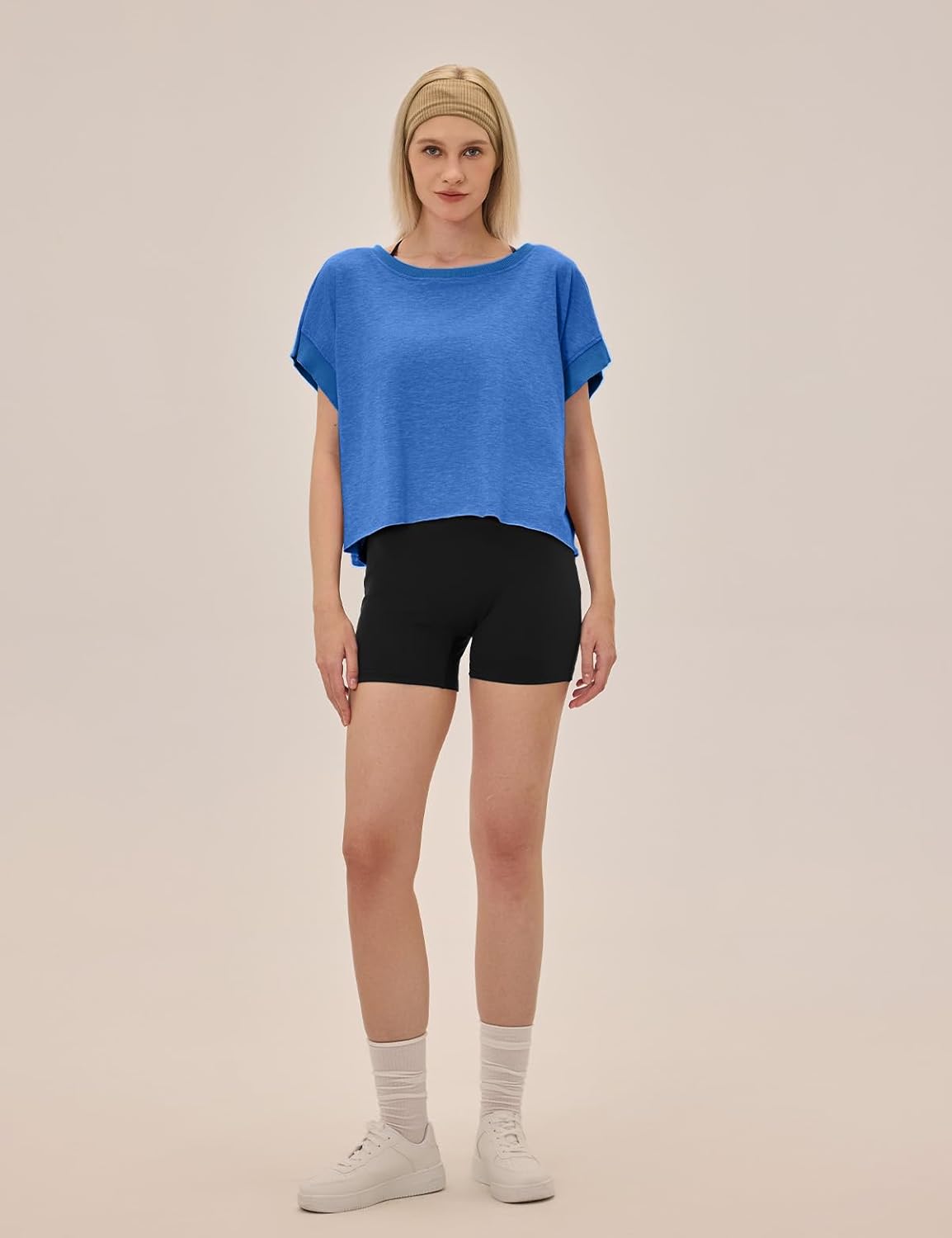 Black open back crop tee with moisture-wicking fabric, shown front and back views for running and yoga — view 3