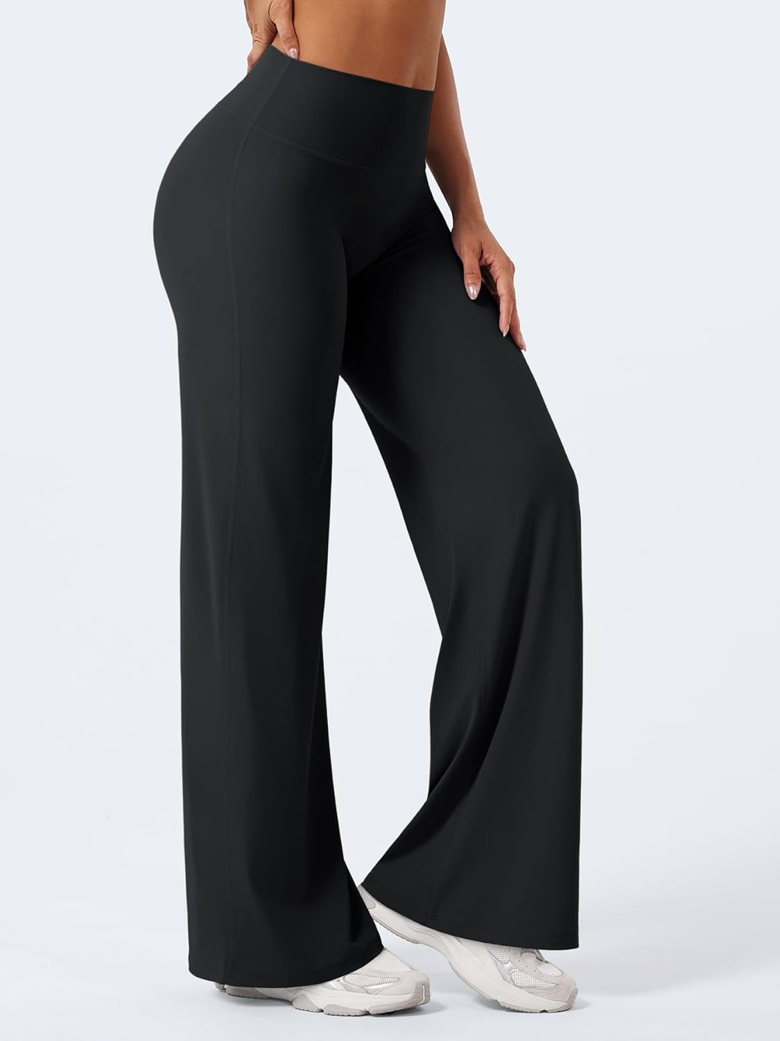 Black high-waisted yoga leggings with squat-proof four-way stretch fabric, front view — view 5
