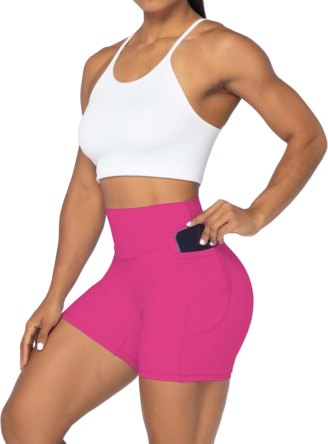Sunzel black biker shorts with no front seam, squat-proof fabric, and tummy control, shown on woman in yoga pose — view 4