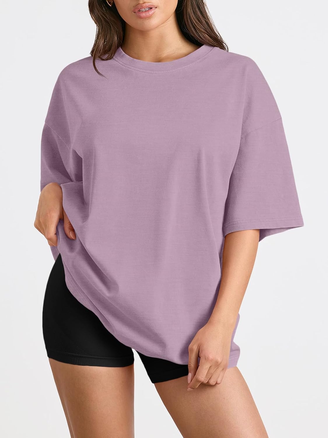 Oversized workout t-shirt in {color} with moisture-wicking fabric, displayed front view on model — view 2