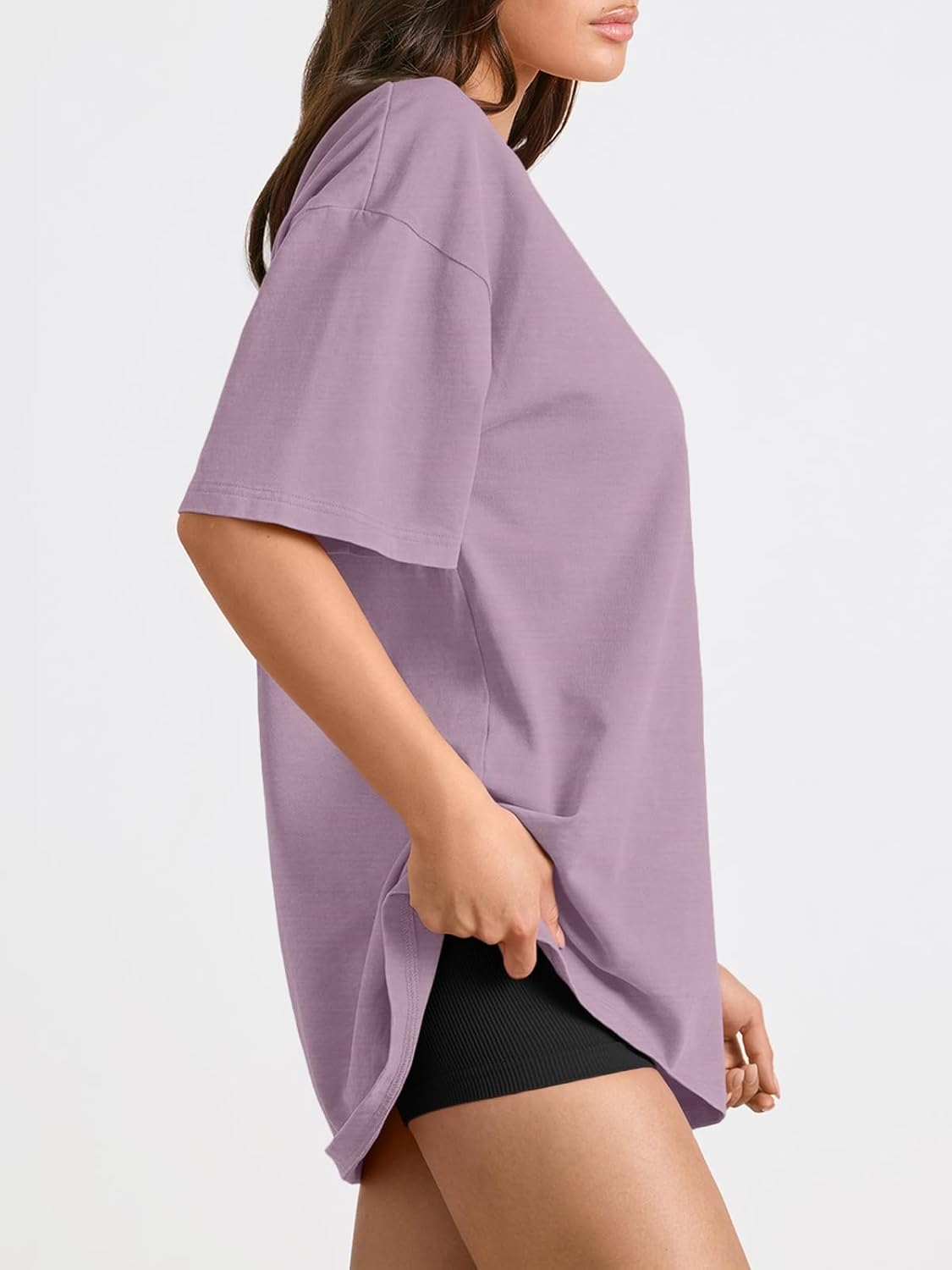 Oversized workout t-shirt in {color} with moisture-wicking fabric, displayed front view on model — view 4