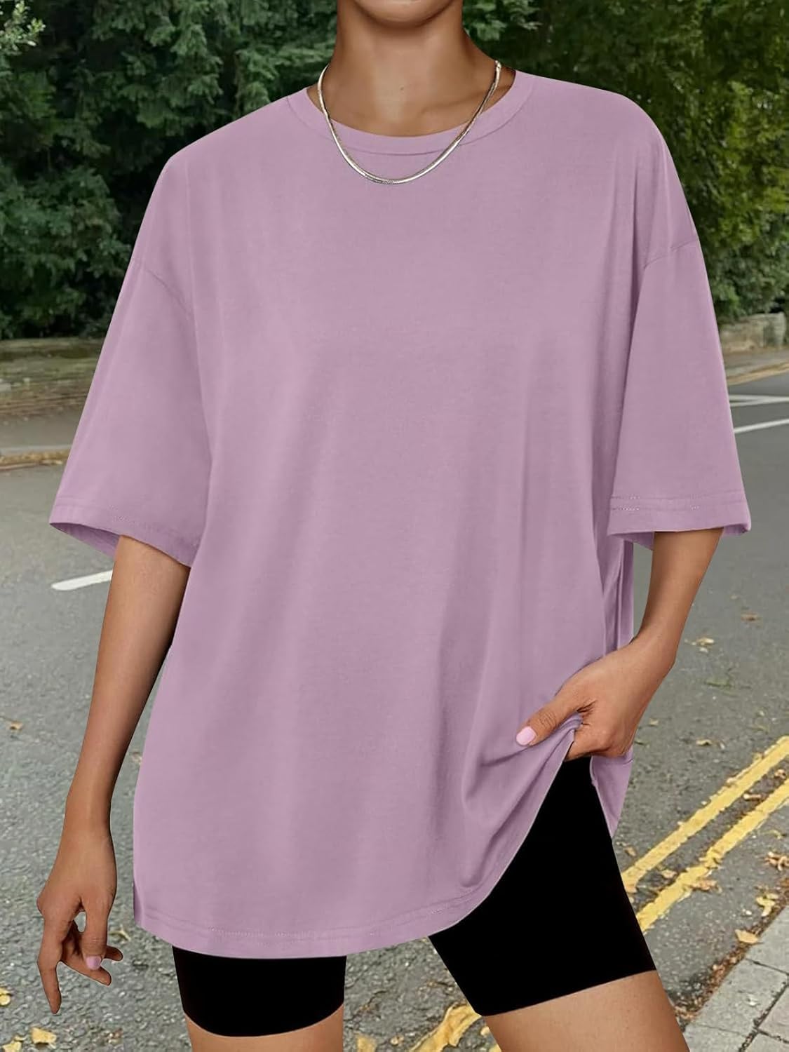 Oversized workout t-shirt in {color} with moisture-wicking fabric, displayed front view on model — view 3