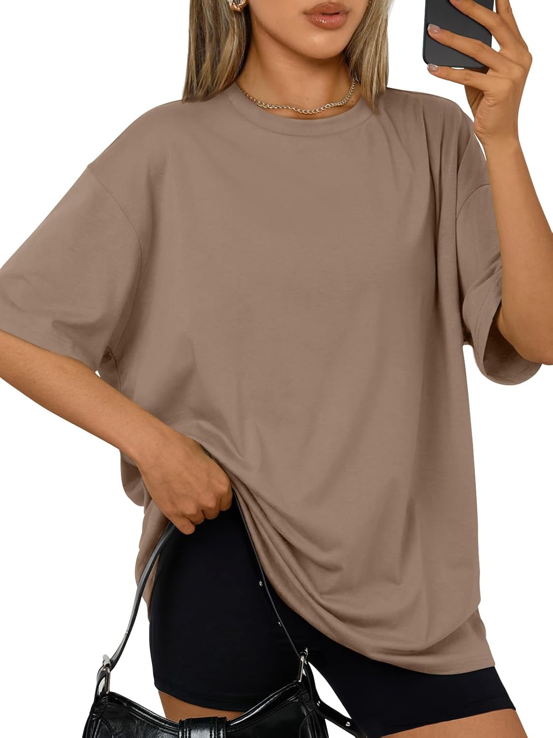 Oversized workout t-shirt in {color} with moisture-wicking fabric, displayed front view on model — view 4