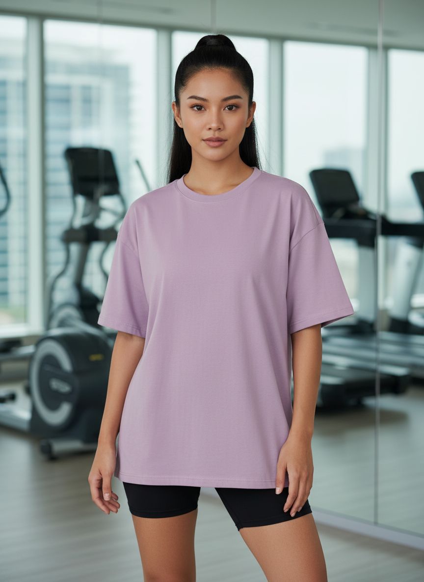 Oversized workout t-shirt in {color} with moisture-wicking fabric, displayed front view on model