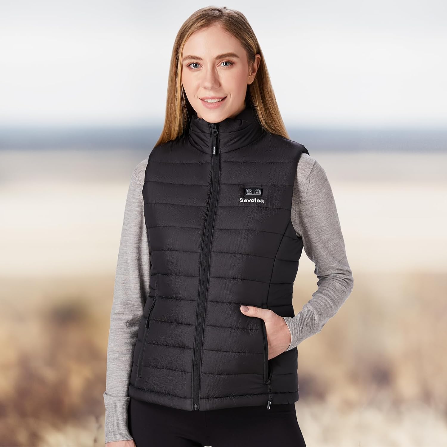 Black heated vest for women with integrated battery pack and electric warming technology — view 2