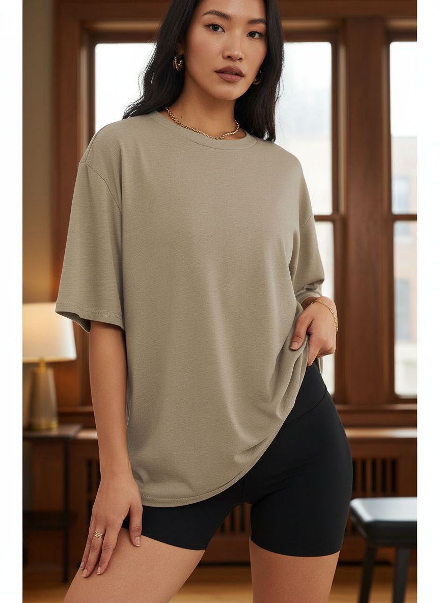 Oversized {color} graphic gym tee with moisture-wicking fabric, loose-fit short sleeve design for athleisure — view 1