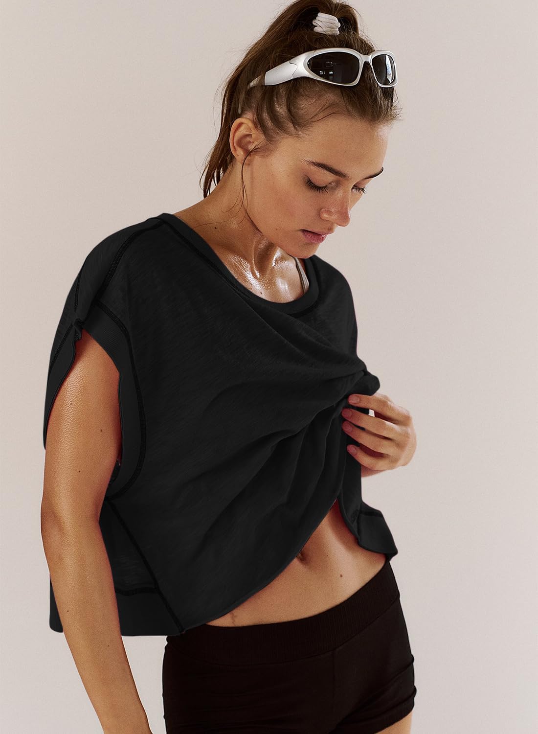Open back yoga crop top in [color] with relaxed fit and moisture-wicking fabric — detail