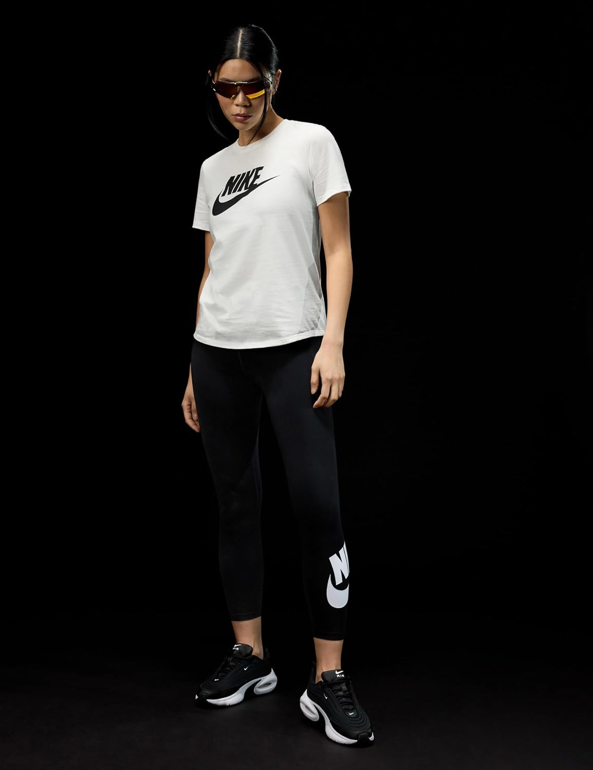 Black high-waisted graphic leggings with four-way stretch fabric, shown from front/back/side view — view 3