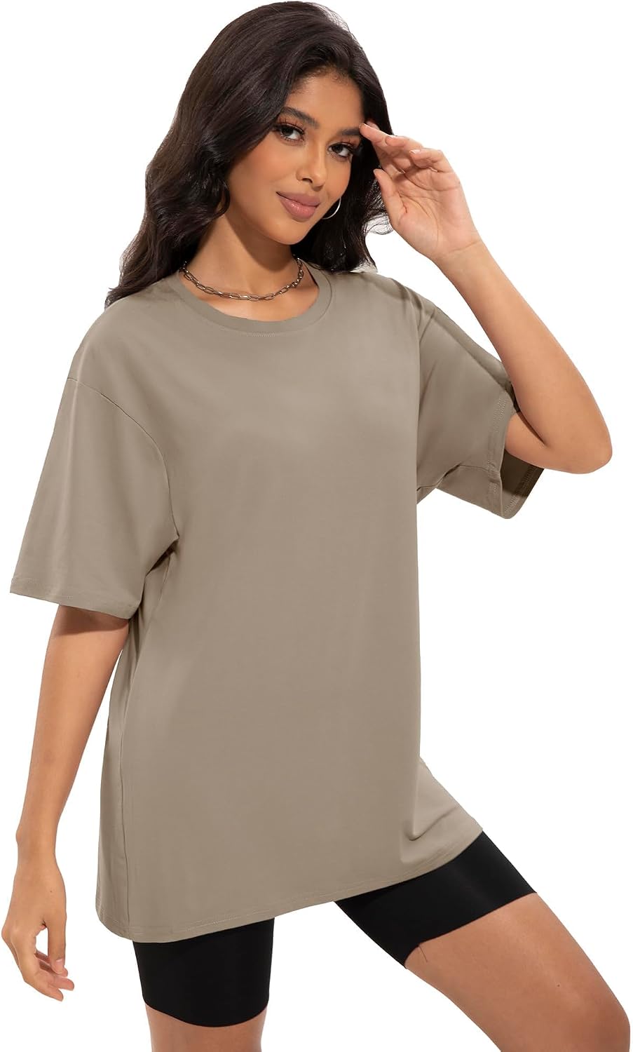 Oversized crew neck t-shirt in {color}, moisture-wicking fabric, relaxed fit for athleisure wear — back