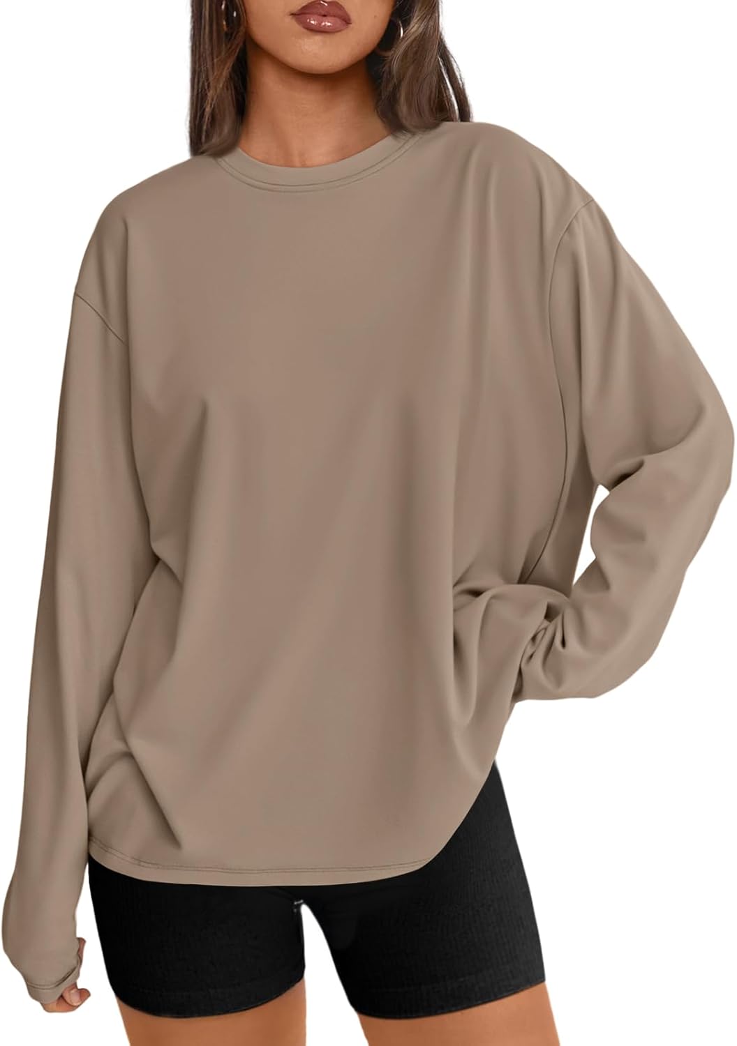 Black oversized long sleeve athleisure top with moisture-wicking fabric — front
