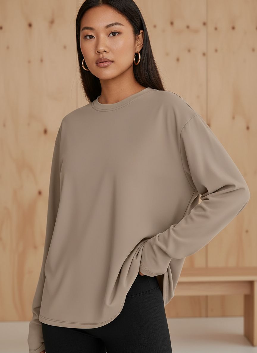 Black oversized long sleeve athleisure top with moisture-wicking fabric — view 1