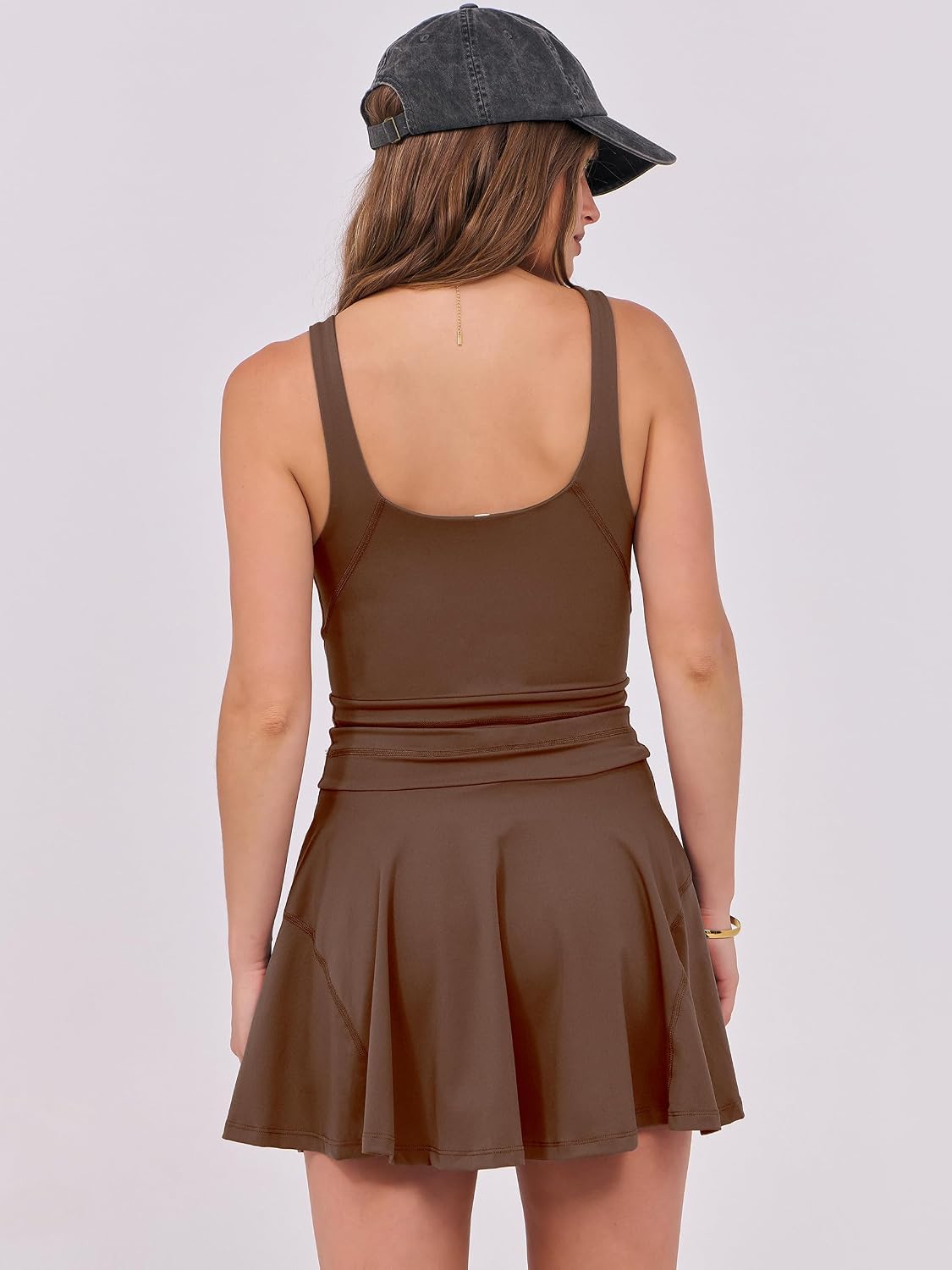 Women's fitted tennis mini dress in {color} with built-in shorts and four-way stretch fabric — view 4