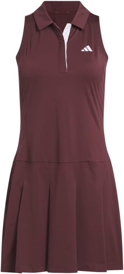 Black pleated golf dress with moisture-wicking four-way stretch fabric, front view — view 1