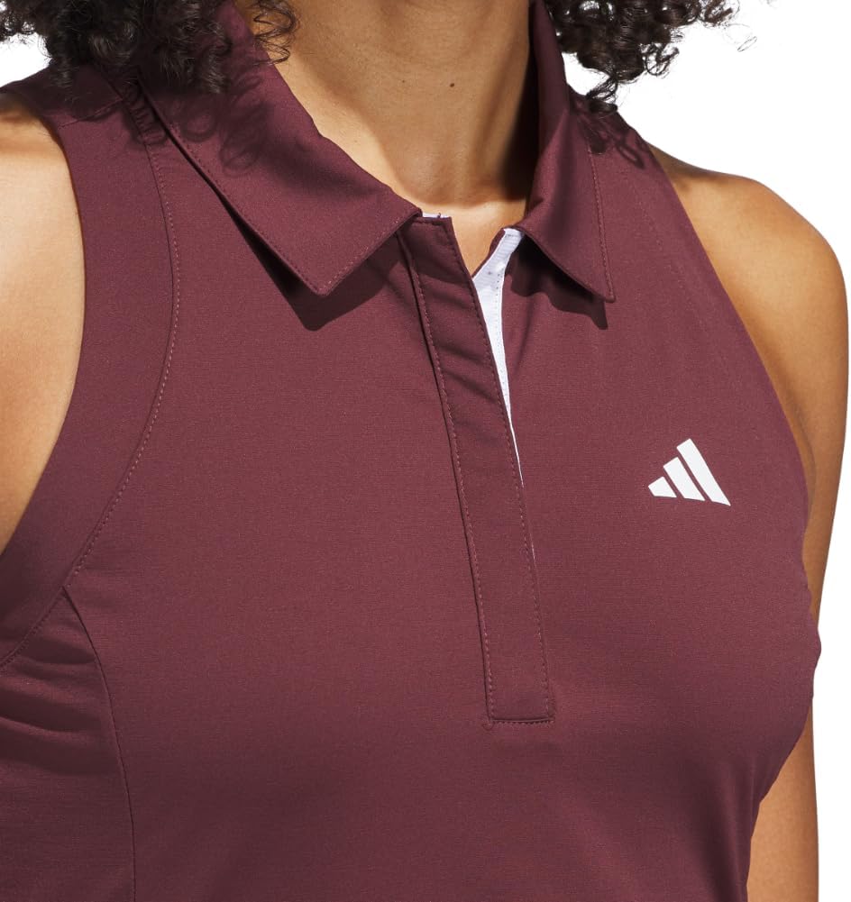 Black pleated golf dress with moisture-wicking four-way stretch fabric, front view — view 2