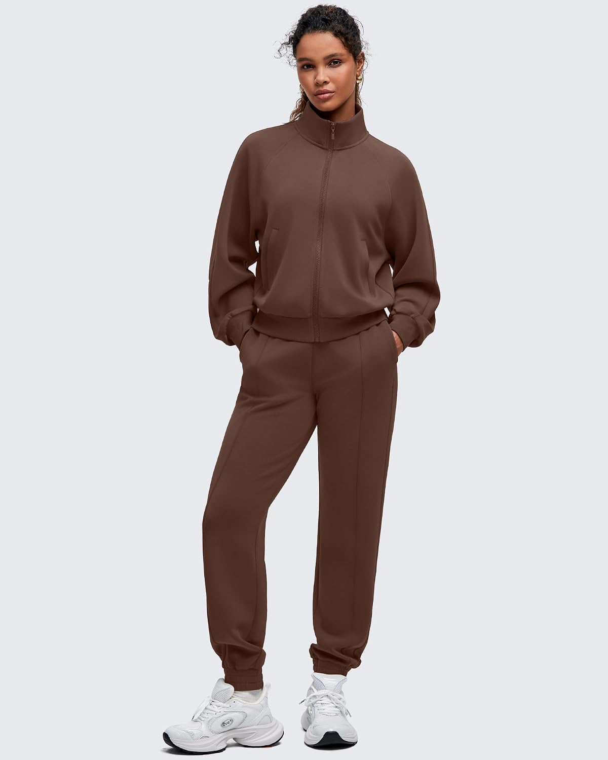 Relaxed-fit modal zip-up athleisure jacket in [color] with mock neck and front pockets — view 1