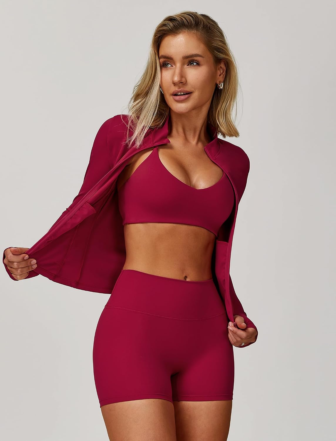 Black 3-piece yoga set featuring zipper long-sleeve jacket, Y-back sports bra, and high-waist shorts with four-way stretch — view 3