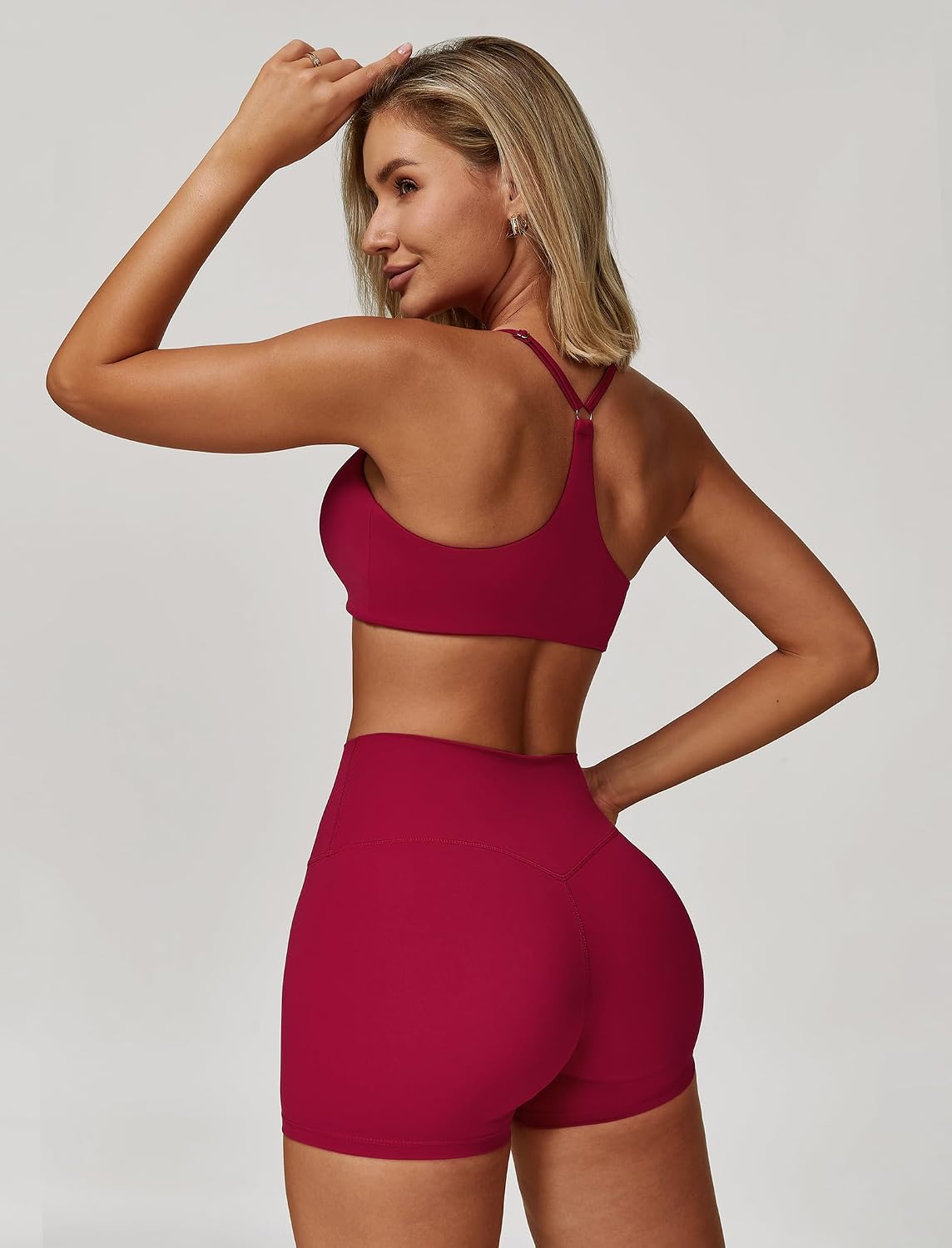 Black 3-piece yoga set featuring zipper long-sleeve jacket, Y-back sports bra, and high-waist shorts with four-way stretch — view 1