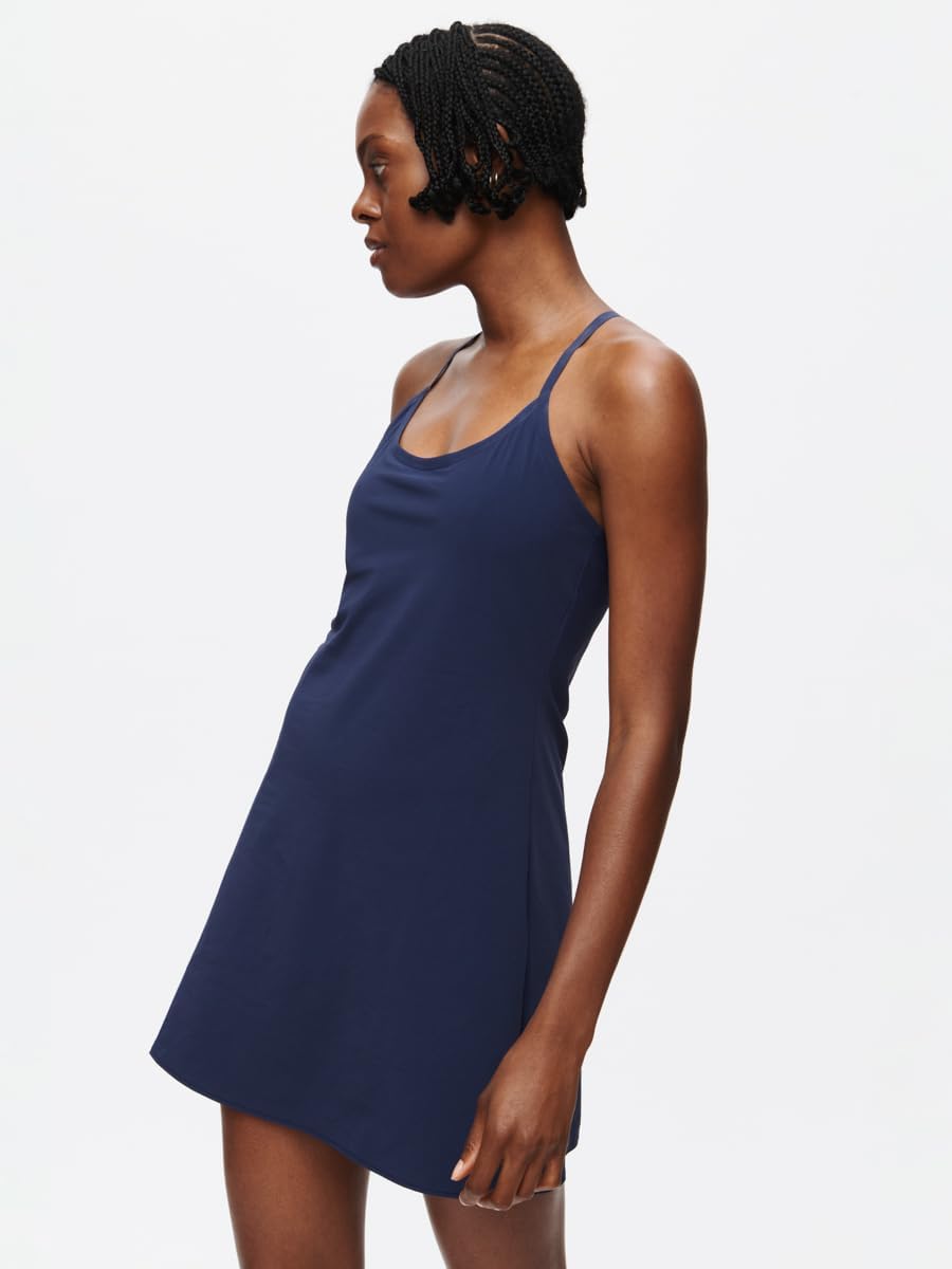 Outdoor Voices Exercise Dress in black with four-way stretch fabric, showcasing semi-fitted athleisure silhouette โ view 1