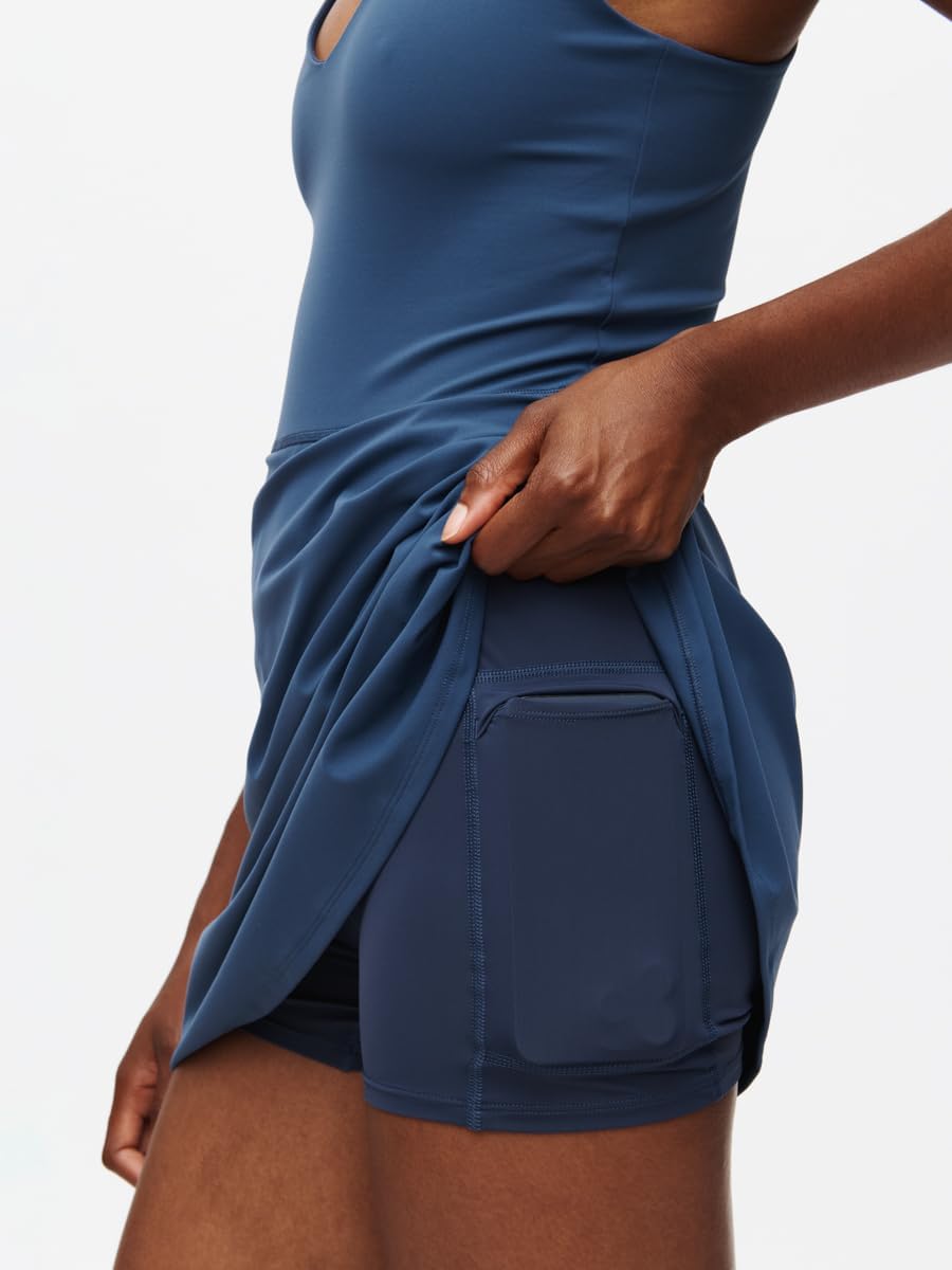 Outdoor Voices Volley Dress in {color} with built-in shorts liner and moisture-wicking fabric — view 1