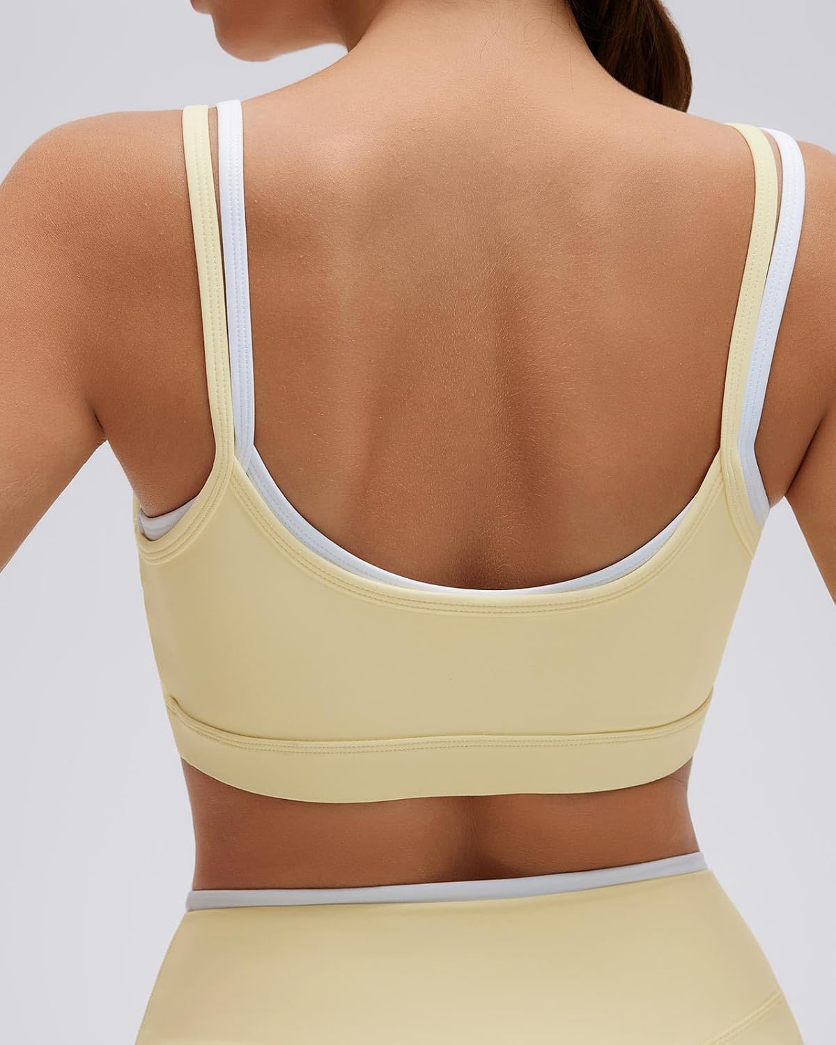 Black multi {product type} with layered sports bra and fitted biker shorts, four-way stretch fabric — detail